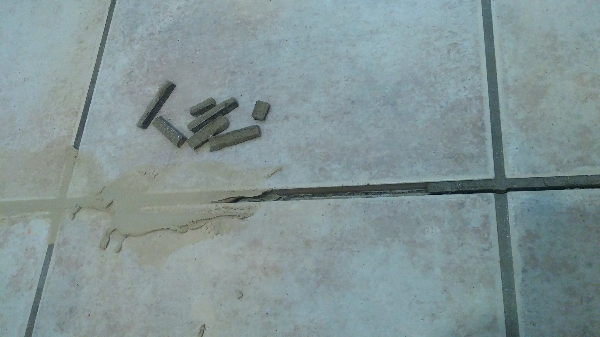 Rock Hard is fast setting to repair missing or hairline cracked grout.